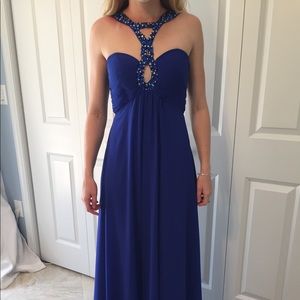 Blue chiffon evening gown with gemstones